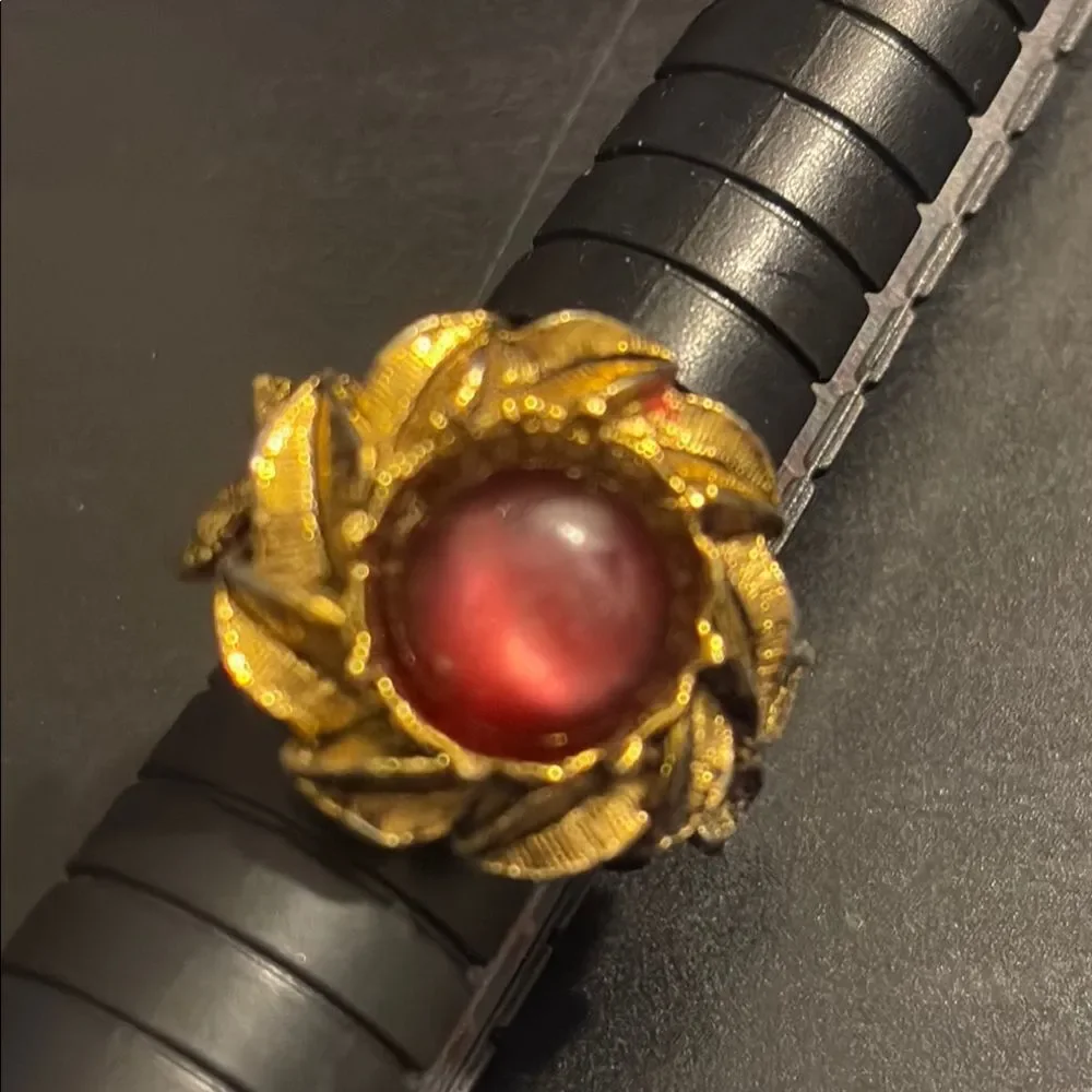 Vintage Gold Flower ring with purple center  adjustable starting at size 7 1/2